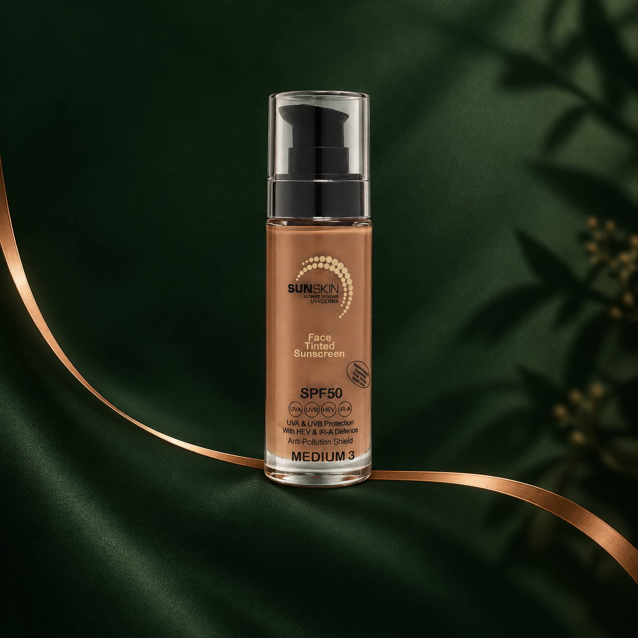 SUNSKIN Face Tinted Sunscreen SPF50, Medium 3, on a forest green background.